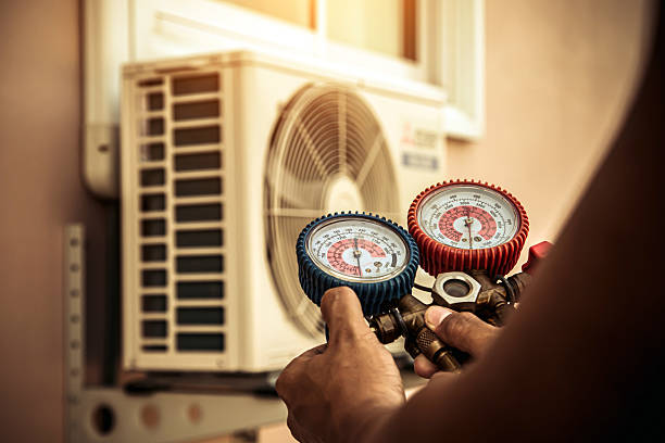 Professional Air Conditioning Service technician working in Fort Johnson, NY